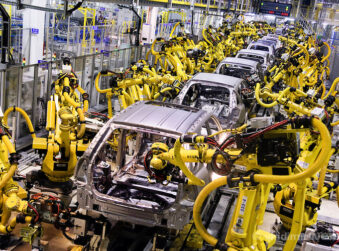 Robot machines weld car bodies at Kia Motors Slovakia plant in Zilina, Slovakia. Photographer: Vladimir Weiss/Bloomberg News